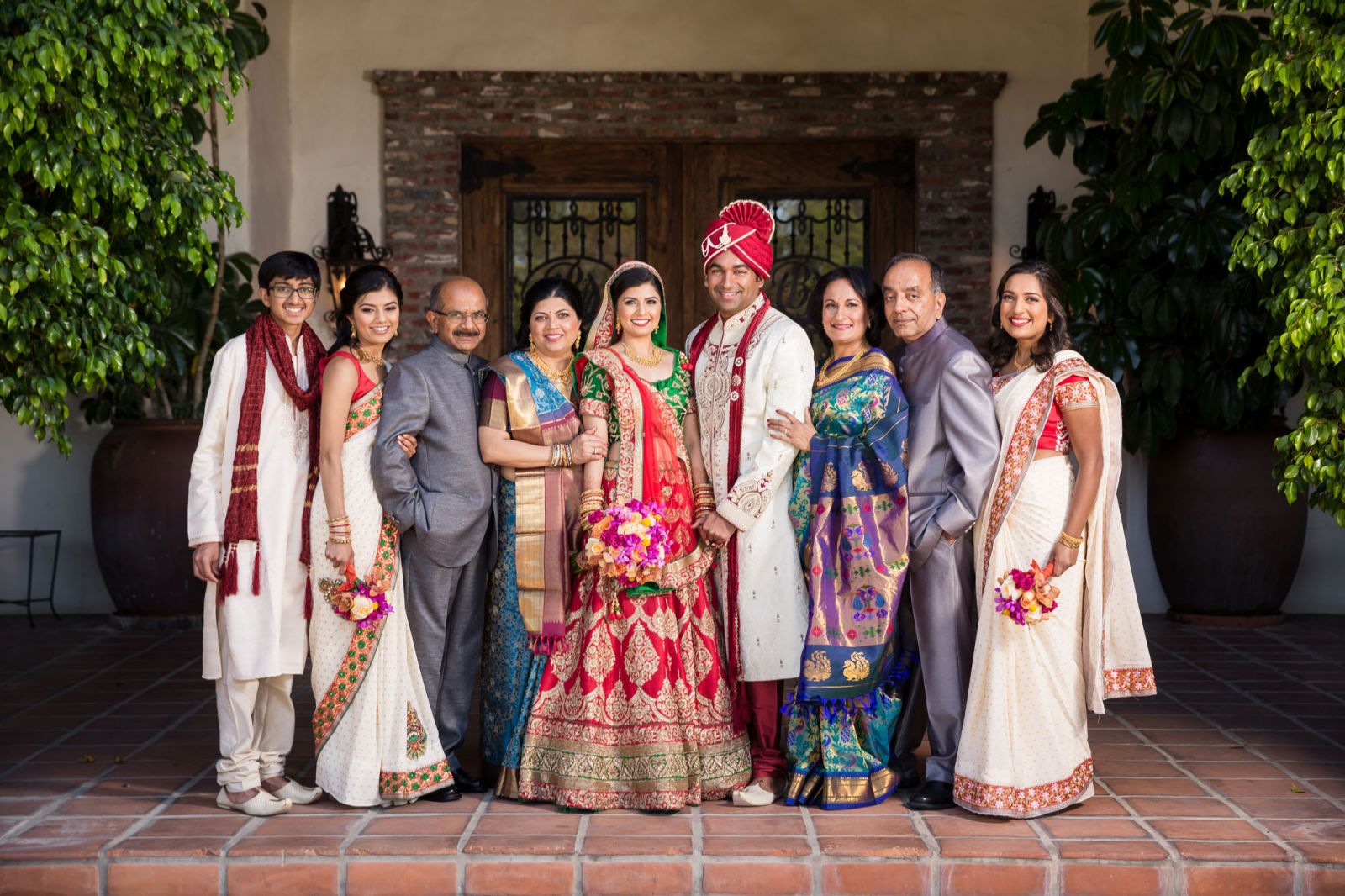 symmetrical group posing for wedding photography